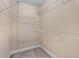 Walk-in closet with white wire shelving for organized storage and easy access at 871 Windsor Creek Dr, Grayson, GA 30017