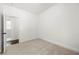 Bright bedroom with neutral carpet and white walls, providing a blank canvas at 1454 Rome Nw Dr, Atlanta, GA 30314