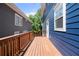 Long view of an outdoor wooden deck between two houses at 1454 Rome Nw Dr, Atlanta, GA 30314