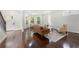 Inviting living room with hardwood floors, large windows, and comfortable seating at 1454 Rome Nw Dr, Atlanta, GA 30314