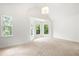 Spacious main bedroom with abundant natural light from several large windows at 1454 Rome Nw Dr, Atlanta, GA 30314