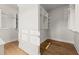 Bright walk-in closet featuring custom shelves and ample storage space at 6750 Pannell Rd, Buford, GA 30518