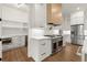 Kitchen boasts stainless appliances, gas range, and a butler's pantry area at 6750 Pannell Rd, Buford, GA 30518