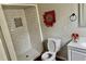 Cozy bathroom featuring a stand up shower with white subway tile and decor at 1516 Chase Ct, Riverdale, GA 30296