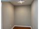 An empty room with hardwood floors and neutral paint at 1516 Chase Ct, Riverdale, GA 30296