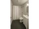 Bathroom features white subway tile in shower, gray tiled floor, new vanity, and tub at 3199 Nw Delmar Ln, Atlanta, GA 30311