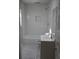 Bright bathroom features a shower with subway tile and a modern vanity with a sink at 3199 Nw Delmar Ln, Atlanta, GA 30311