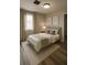 Inviting bedroom with a comfortable bed, neutral decor, and soft lighting, creating a relaxing atmosphere at 3199 Nw Delmar Ln, Atlanta, GA 30311