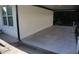 The covered carport features a concrete floor and sturdy columns, offering shade and protection at 3199 Nw Delmar Ln, Atlanta, GA 30311