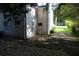 Home exterior with backyard path, utility access, and small windows at 3199 Nw Delmar Ln, Atlanta, GA 30311