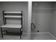 Laundry room with tile floors, shelving, and washer/dryer hookups at 3199 Nw Delmar Ln, Atlanta, GA 30311