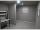 Room featuring gray walls, wood look floors, and desk at 3199 Nw Delmar Ln, Atlanta, GA 30311