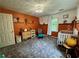 Bedroom design showcases an orange and white color scheme, gray carpet, and ample natural light at 4114 Falcon Shores Nw Ct, Acworth, GA 30101