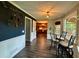 Cozy breakfast nook with views into the kitchen and an outdoor deck at 4114 Falcon Shores Nw Ct, Acworth, GA 30101