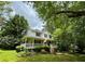 Attractive two-story home featuring a charming front porch, perfect for relaxing and enjoying the outdoors at 4114 Falcon Shores Nw Ct, Acworth, GA 30101