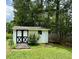 Outbuilding/shed in backyard providing storage and additional outdoor space at 4114 Falcon Shores Nw Ct, Acworth, GA 30101