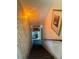 View of textured staircase and wall leading to basement with 'Peace' sign at 4114 Falcon Shores Nw Ct, Acworth, GA 30101