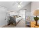 Tranquil bedroom features wainscotting, and a neutral color palette creating a warm and inviting space at 654 Cannon Rd, Sharpsburg, GA 30277