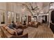 Covered deck featuring a seating area, ceiling fan, and decorative lighting at 654 Cannon Rd, Sharpsburg, GA 30277