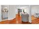 Open-concept living room connecting to a bathroom, kitchen, and a bright and inviting play area at 654 Cannon Rd, Sharpsburg, GA 30277