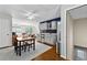 Cozy living room featuring a dining area and wet bar at 654 Cannon Rd, Sharpsburg, GA 30277