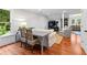 Spacious living room with wood floors, desk, and comfortable seating area at 654 Cannon Rd, Sharpsburg, GA 30277