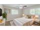 Serene bedroom with plush bedding, soft lighting, and a calming color scheme at 1982 Yucca Dr, Decatur, GA 30032