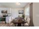 Eat-in kitchen with stainless steel appliances, granite countertops, and a dining table at 1982 Yucca Dr, Decatur, GA 30032