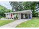 Single-story home with carport, brick facade, well-kept lawn and minimalist landscaping at 1982 Yucca Dr, Decatur, GA 30032