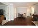Bright hallway featuring hardwood floors and open access to other rooms at 2311 Arnold Palmer Way, Duluth, GA 30096