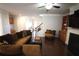 Welcoming living room with hardwood floors, a fireplace and a spacious layout at 2311 Arnold Palmer Way, Duluth, GA 30096