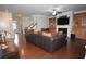 Inviting living room with fireplace, built-ins, and hardwood floors at 2311 Arnold Palmer Way, Duluth, GA 30096