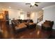 Cozy living room featuring hardwood floors, recessed lighting, and comfortable seating at 2311 Arnold Palmer Way, Duluth, GA 30096