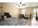 Inviting office space with a comfortable chair, desk, and ample natural light at 2311 Arnold Palmer Way, Duluth, GA 30096