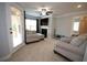 Cozy sitting room area with a fireplace, TV and comfortable seating at 2311 Arnold Palmer Way, Duluth, GA 30096
