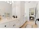 Well-lit bathroom with modern fixtures, white cabinetry, and a clean, inviting aesthetic at 2430 Flat Stone Dr, Cumming, GA 30041
