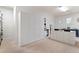Spacious walk-in closet offers ample storage with custom cabinets and shelving throughout at 2430 Flat Stone Dr, Cumming, GA 30041