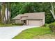 Charming home with a two-car garage and a well-manicured lawn at 4818 Terrace Green Trce, Stone Mountain, GA 30088