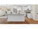 Modern kitchen featuring white cabinets, granite countertops, and stainless steel appliances at 4818 Terrace Green Trce, Stone Mountain, GA 30088
