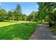 Neighborhood park with walking path and picnic benches at 4818 Terrace Green Trce, Stone Mountain, GA 30088
