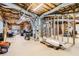 Unfinished basement with exposed beams and utilities, offering potential for customization at 6520 Indian Acres Trl, Tucker, GA 30084