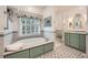 Luxurious bathroom featuring a soaking tub, glass-enclosed shower, and elegant finishes at 6520 Indian Acres Trl, Tucker, GA 30084