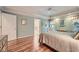 Spacious bedroom features hardwood floors, tray ceilings, and ample natural light at 6520 Indian Acres Trl, Tucker, GA 30084