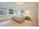Cozy bedroom with carpet flooring, bright windows, and simple decor at 6520 Indian Acres Trl, Tucker, GA 30084