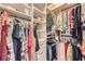 Walk-in closet with custom shelving and ample storage space for clothes and accessories at 6520 Indian Acres Trl, Tucker, GA 30084