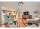 Open living room view with hardwood floors leading to the kitchen and a comfortable seating area at 6520 Indian Acres Trl, Tucker, GA 30084