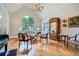 Spacious living room with vaulted ceilings, hardwood floors, and decorative chandelier at 6520 Indian Acres Trl, Tucker, GA 30084