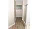 Bathroom showing a shower space with a glass door, window, and neutral walls and flooring at 9130 Charlton Pl, Douglasville, GA 30135