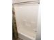 Clean white bathtub and shower combination at 9130 Charlton Pl, Douglasville, GA 30135