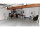 This large garage area offers exposed rafters and an abundance of storage space at 9130 Charlton Pl, Douglasville, GA 30135